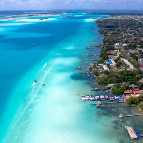 aerial view of bacalar lagoon with crystal clear blue water