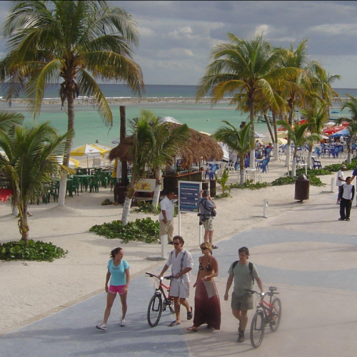 palm lined beachfront promenade in mahahual