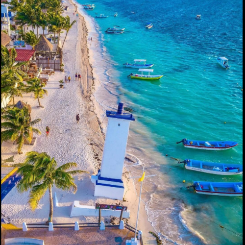 the leaning lighthouse in puerto morelos by the beach